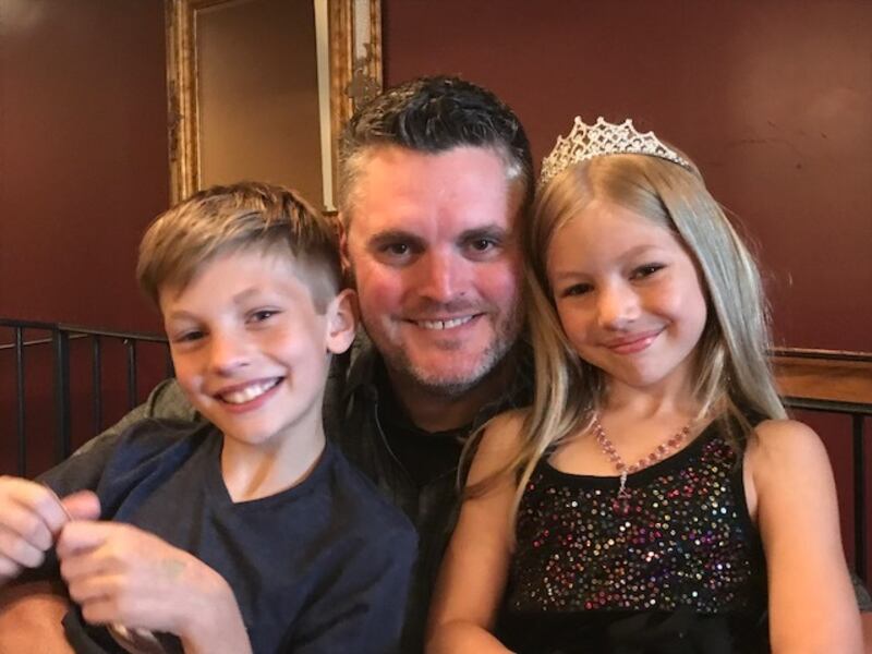 Jamie Beardslee with his son Jax and daughter Ali. The Okemos, Michigan, man is a stay-at-home dad, though he's thinking about returning to work now that the children are older.