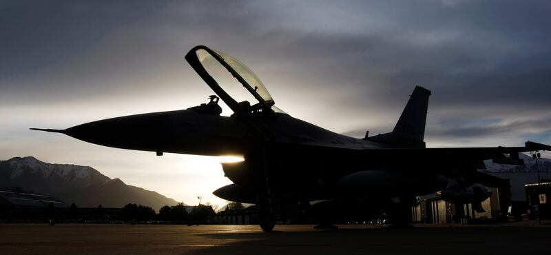 Two planes sit on the pad waiting for the pilots to arrive. Two F-16s leave for South Dakota. They are the first of 24 that will eventually leave hill for South Dakota. That will lead to the inactivation of Hill Air Force Base’s 34th Fighter Squadron. Tuesday, April 27, 2010. Photo by Scott G Winterton Deseret News.