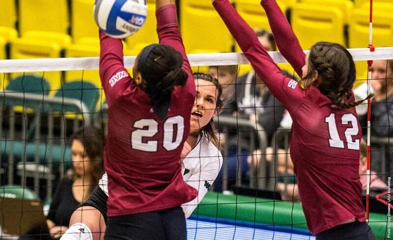 UVU junior outside hitter Lexi Thompson (back center) goes for an attack against New Mexico State on Oct. 20. Thompson led Utah Valley on Thursday night by notching her first double-double of the season with 21 kills and 10 digs.