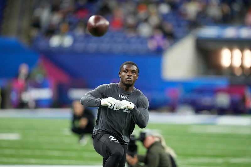 Utah defensive back Clark Phillips catches the football at the NFL combine.