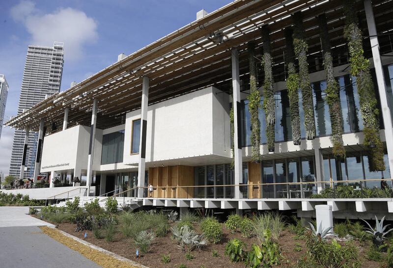 A South Florida artist is facing a criminal charge after police say he smashed a $1 million vase at Miami's new art museum in what appears to be a form of protest.