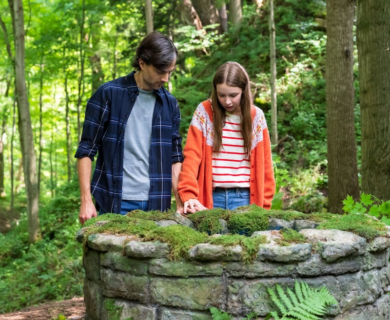 Ruby O’Reilly, played by Zoe Wiesenthal, with her father, Daniel O’Reilly, played by Kristopher Turner, stand at the well in “Ruby and the Well.”