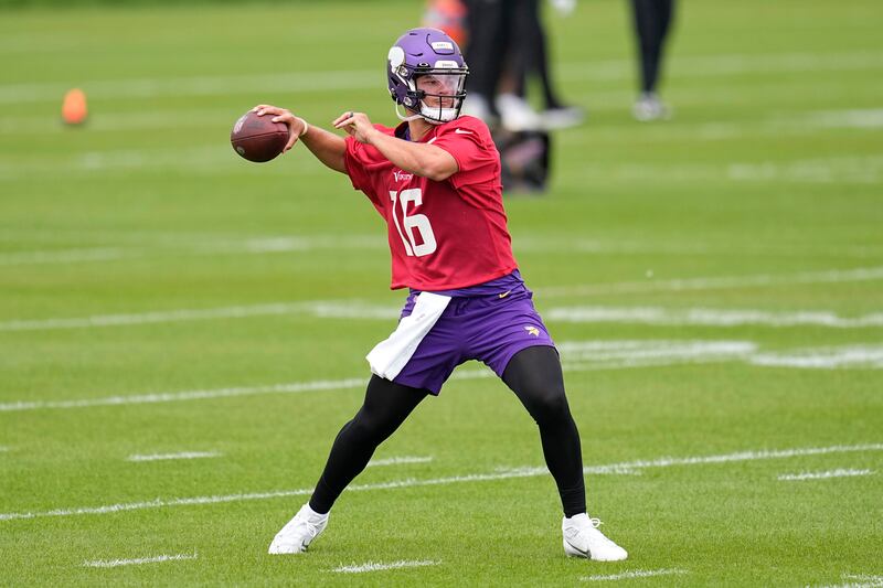 Minnesota Vikings quarterback Jaren Hall (16) takes part in drills during the NFL football team’s rooking camp in Eagan, Minn., Friday, May 12, 2023. (AP Photo/Abbie Parr)