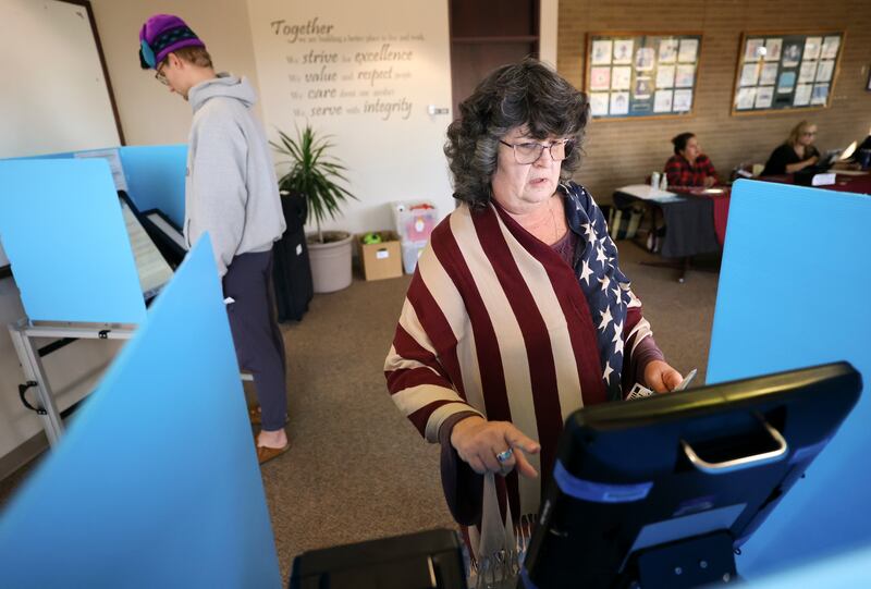 Lorrie Callaway votes early at the Salt Lake County Government Center in Salt Lake City on Thursday, Nov. 3, 2022.