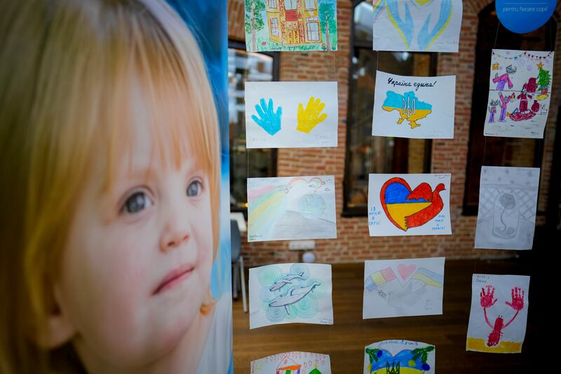 Children’s drawings are presented at a UNICEF organized exhibition of drawings by Ukrainian refugee children and Romanian children.
