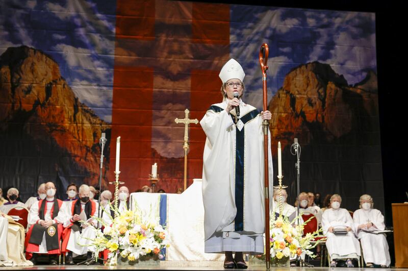 Phyllis Spiegel is ordained as a bishop and speaks on stage.