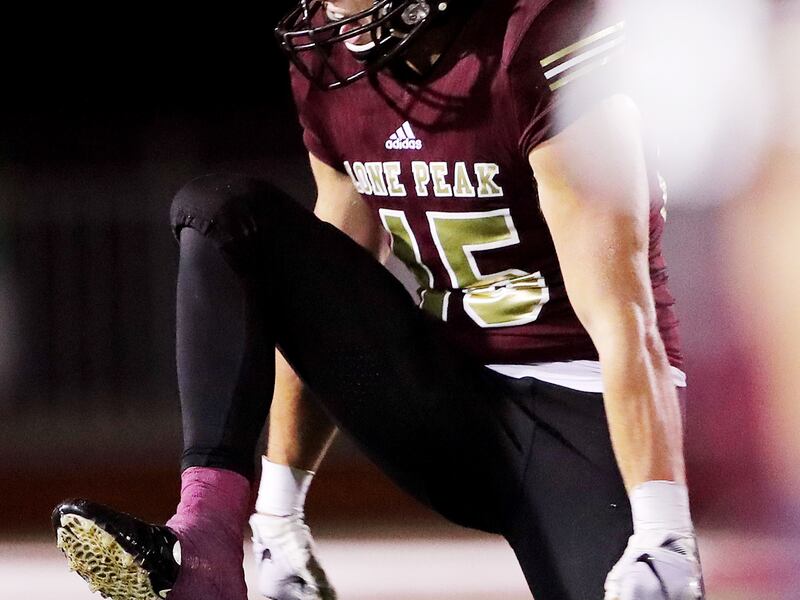 Lone Peak's Michael Daley celebrates after a sack as Lone Peak and Herriman open the 2018-19 football season at Lone Peak on Friday, Aug. 17, 2018.