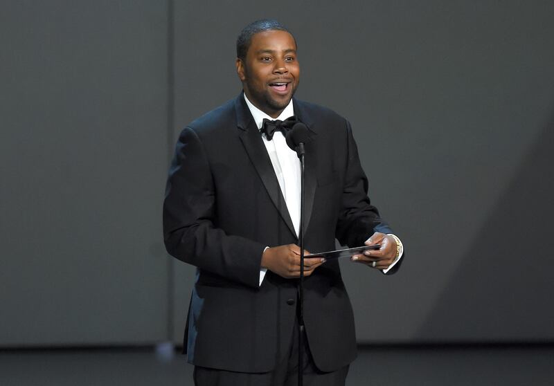 In this Sept. 17, 2018, file photo Kenan Thompson presents the award for outstanding drama series at the 70th Primetime Emmy Awards at the Microsoft Theater in Los Angeles. Thompson of “Saturday Night Live” and Hasan Minhaj of Netflix’s “Patriot Act with Hasan Minhaj” will headline this year’s White House Correspondents’ Dinner which takes place April 25, 2020.