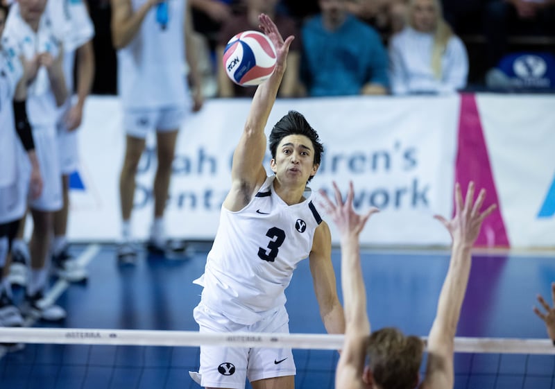 BYU’s Kupono Browne goes for a spike during match against Ball State on Friday, Feb. 4, 2022, at Smith Fieldhouse in Provo.