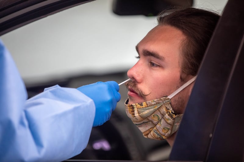 A man gets a COVID-19 test.