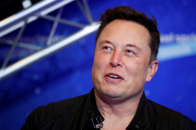 Elon Musk arrives on the red carpet.