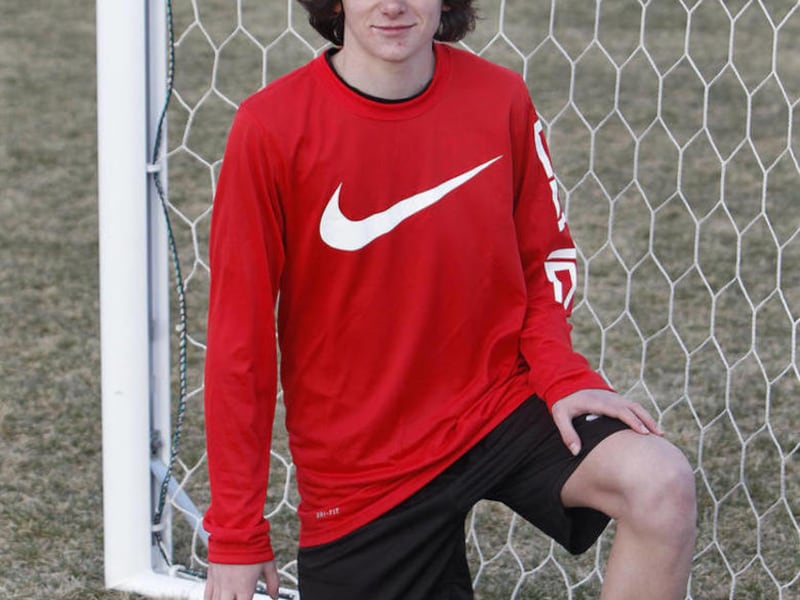 Taylor Booth poses for a portrait in Layton Thursday, March 12, 2015.