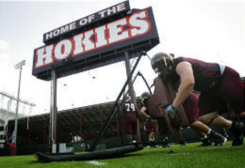Virginia Tech football players have victims of this past spring's mass shooting in mind as they prepare for the upcoming season.