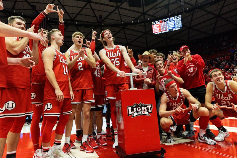 Utah Utes celebrate their victory over rival BYU during at the Jon M. Huntsman Center in Salt Lake City on Dec. 9, 2023.