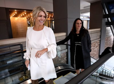 Jenny Cushing, Vestar vice president of leasing, and Jacklyn Briggs, Vestar marketing director, ride an escalator at The Gateway in Salt Lake City on Thursday, Nov. 1, 2018.