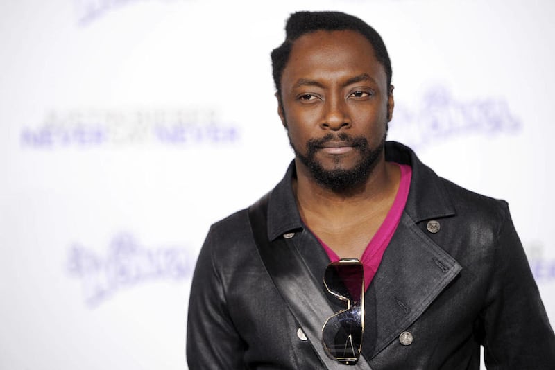 Will.i.am arrives at the premiere of the documentary film, "Justin Bieber: Never Say Never," in Los Angeles, Tuesday, Feb. 8, 2011.