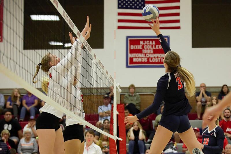 DSU junior middle blocker Kayla Chapman (right) goes for one of her team-high 10 kills in the Trailblazers' 3-0 loss to Biola on Saturday night in St. George.