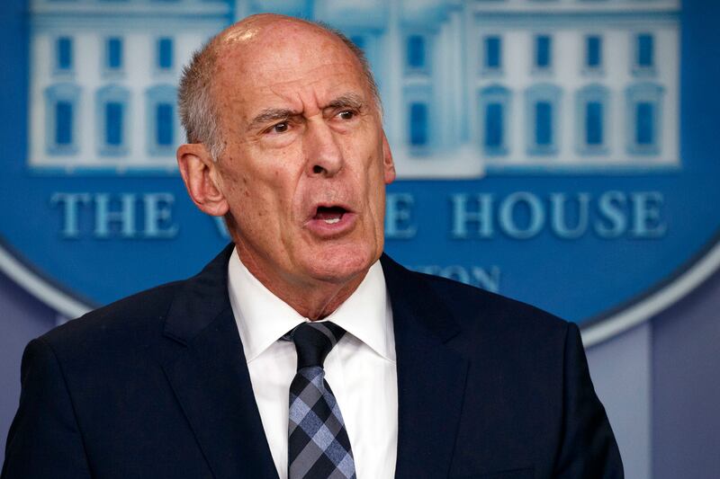 FILE - In this Aug. 2, 2018, file photo, Director of National Intelligence Dan Coats speaks during a daily press briefing at the White House in Washington. Coats is to resign in days, after a two-year tenure marked by President Donald Trump's clashes with