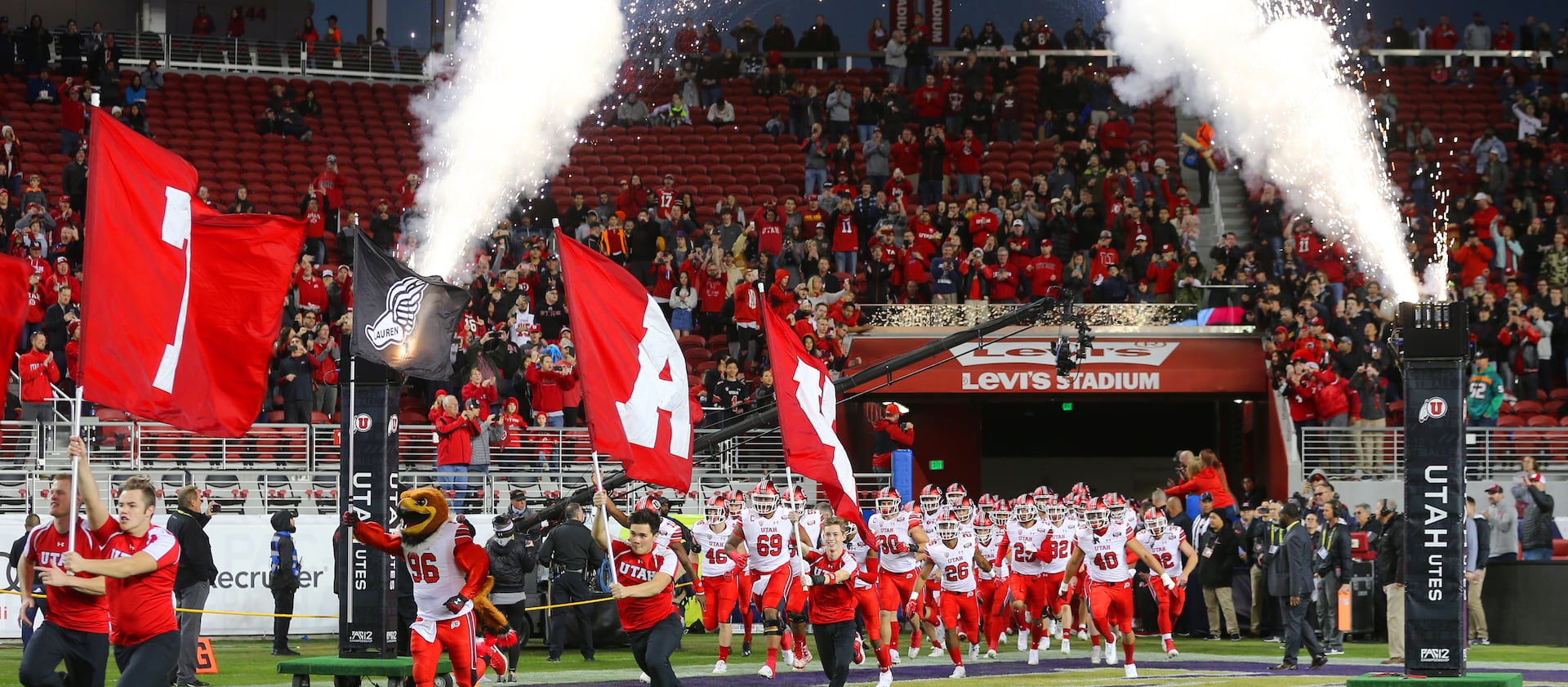 Utah runs onto the field as they and Washington play in the Pac-12 Championship game at Levi’s Stadium in Santa Clara on Friday, Nov. 30, 2018.
