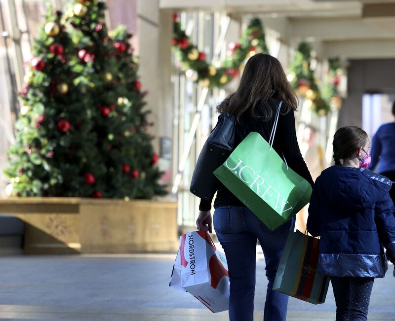 Shoppers walk through the City Creek Center in Salt Lake City on Friday. Despite the stubborn, albeit easing shadow of inflation looming over the U.S. economy, some Salt Lake City shoppers still opted to venture out over the holiday weekend to support businesses local businesses.