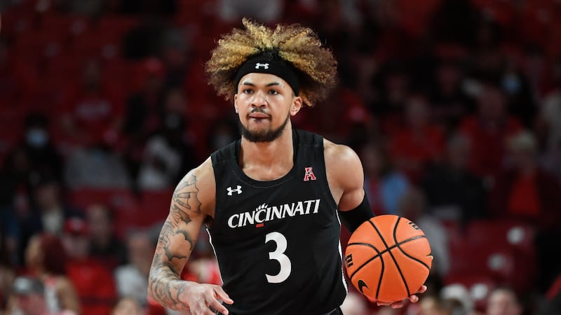 Cincinnati guard Mike Saunders Jr. (3) brings the ball up court against Houston during the first half of an NCAA college basketball game Tuesday, March 1, 2022, in Houston.