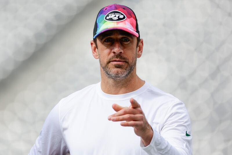 New York Jets quarterback Aaron Rodgers walks on the field before a game against the Philadelphia Eagles, Sunday, Oct. 15, 2023.