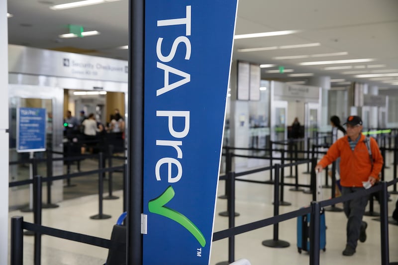 A man makes his way through a TSA Precheck security line inside Terminal 2 of San Francisco International Airport in 2019.