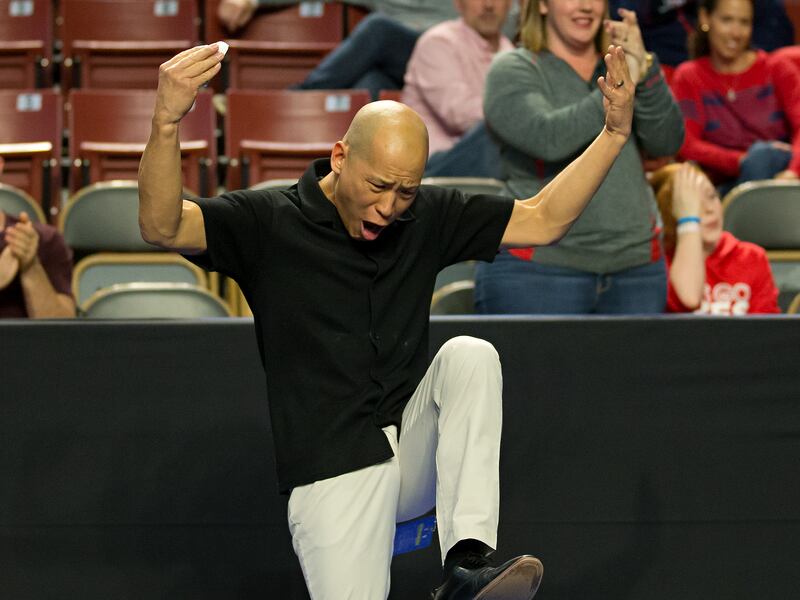 University of Utah head coach Tom Farden celebrates during the Pac-12 championships.