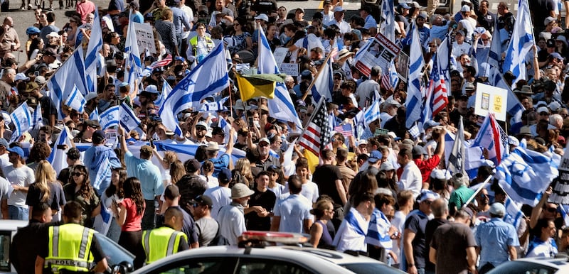 Israel supporters gather during a march in West Los Angeles in front of the Simon Wiesenthal Center and Museum of Tolerance on Oct. 15, 2023.