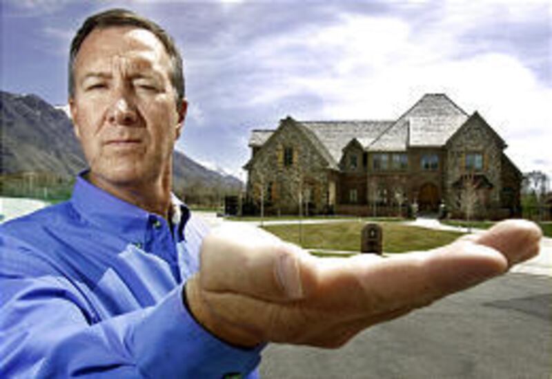 Bill Conley poses outside his Alpine home. Conley says the home is 1,800 square feet smaller than what he was told.