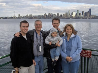 West Valley City police recovered this family photo from one of Josh Powell's digital devices. It shows Michael Powell, left, Steve Powell, Charlie Powell, Josh Powell and Susan Powell posing in front of the Seattle skyline. Metadata suggests the photo wa