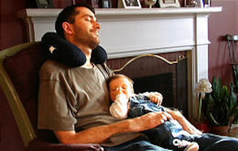 Stephen Heywood holds his son, Alex, in "So Much So Fast."