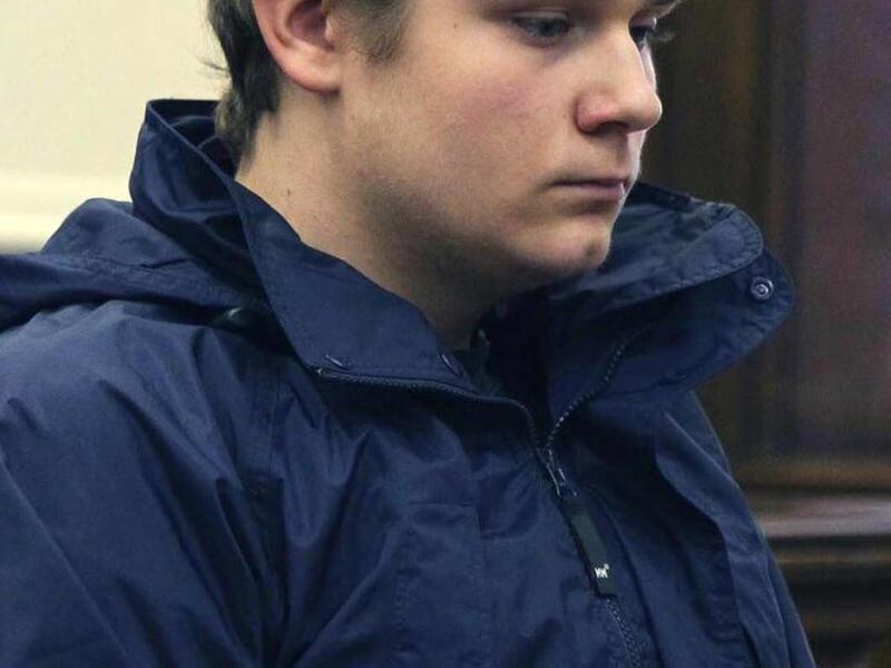 Brogan Rafferty, 16, of Stow, Ohio listens during a hearing in the courtroom of Judge John W. Nau at the Noble County Courthouse on Tuesday, Nov. 29, 2011, in Caldwell, Ohio. Rafferty faces juvenile charges of aggravated murder, complicity to aggravated m
