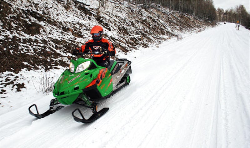 Jared Nielsen of Wellsville snowmobiles in Tony Grove area. The Forest Service is opening more land in Logan Canyon to the sport.