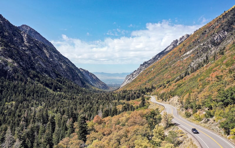 A car drives up Little Cottonwood Canyon on Thursday, Sept. 23, 2021.