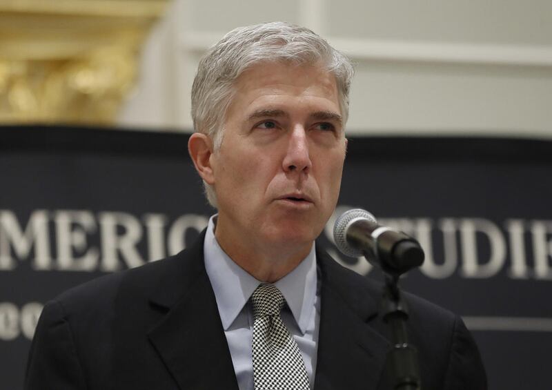 FILE - Supreme Court Justice Neil Gorsuch speaks at the 50th anniversary of the Fund for America Studies luncheon at the Trump Hotel in Washington, Thursday, Sept. 28, 2017. Disputes over a wedding cake for a same-sex couple and partisan electoral maps to