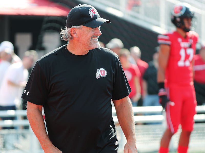 Utah head coach Kyle Whittingham watches warmups during the opener at Rice-Eccles Stadium in Salt Lake City, Sept. 2, 2021.