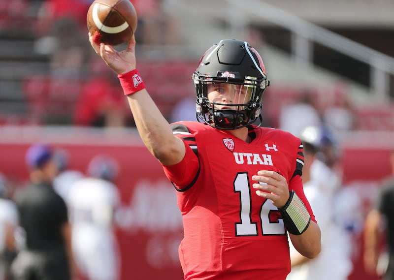 Utah quarterback Charlie Brewer warms up during the season opener at Rice-Eccles Stadium in Salt Lake City, Sept. 2, 2021.