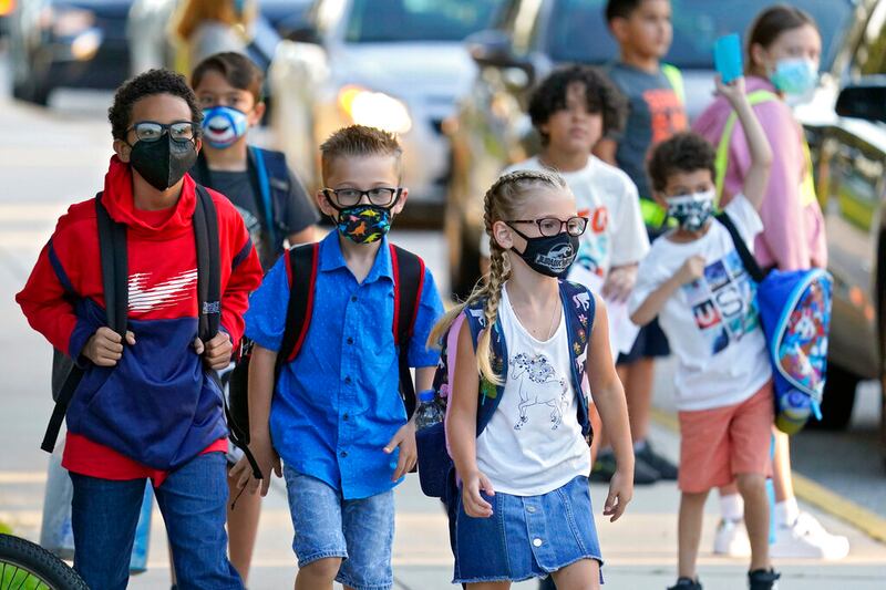 Students arrive for the first day of school in Florida.