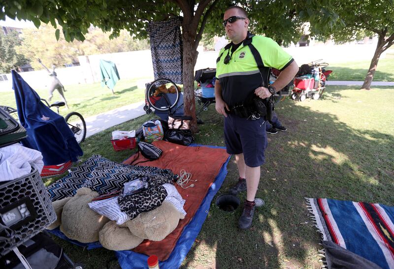 Salt Lake City police officer Austin Gold patrols Library Square in Salt Lake City on Tuesday, Aug. 14, 2018.