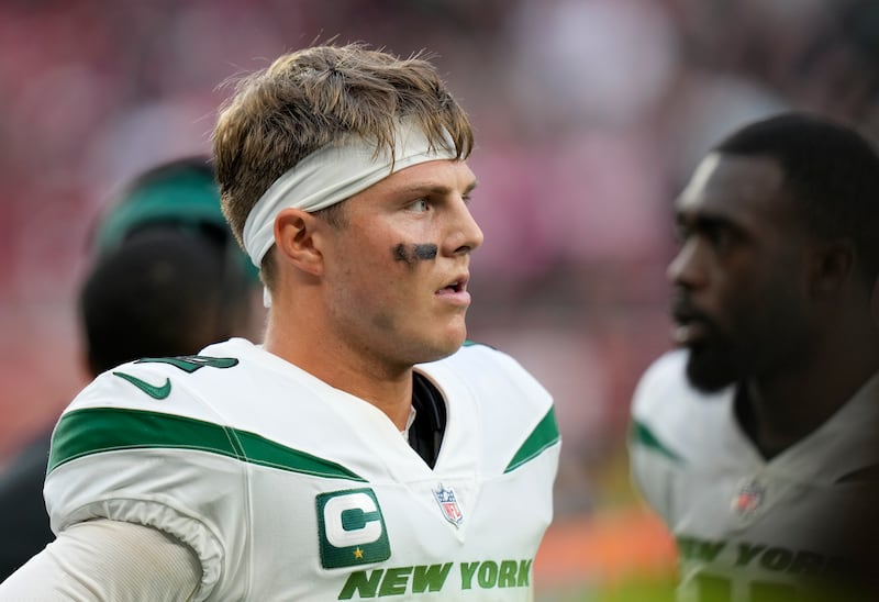New York Jets quarterback Zach Wilson (2) stands on the field after an NFL football game between the New York Jets and the Atlanta Falcons.
