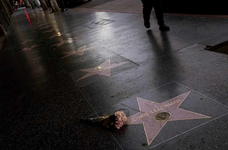Flowers lie on the Hollywood Walk of Fame star of the late Oscar-winning actress Cloris Leachman, Wednesday, Jan. 27, 2021, in Los Angeles. Cloris Leachman had a brief moment in ‘Butch Cassidy and the Sundance Kid.’