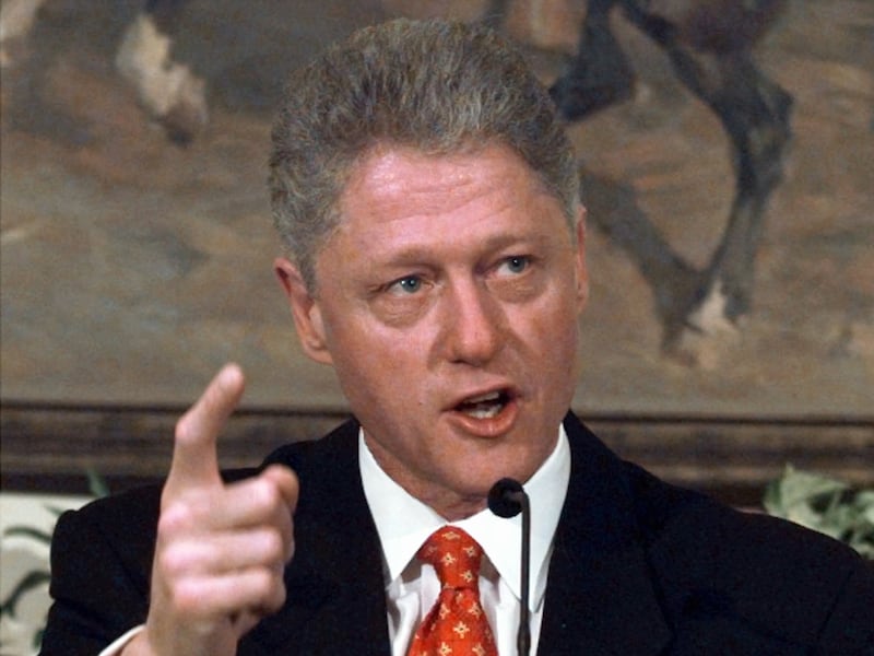 President Clinton angrily shakes his finger as he denies any improper behavior with an intern during an event Monday, Jan. 26, 1998, in the White House Roosevelt Room.
