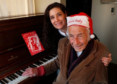 Philip Springer, composer of the Christmas classic "Santa Baby," with his daughter Tamar Springer.