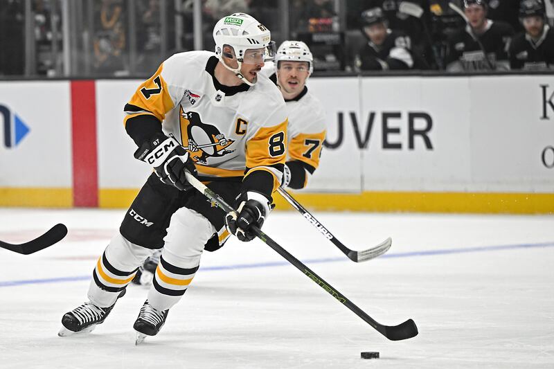 Pittsburgh Penguins center Sidney Crosby controls the puck during game against the Los Angeles Kings, Monday, Jan. 20, 2025, in Los Angeles. Crosby will be paying Utah a visit Wednesday to face the Utah Hockey Club.