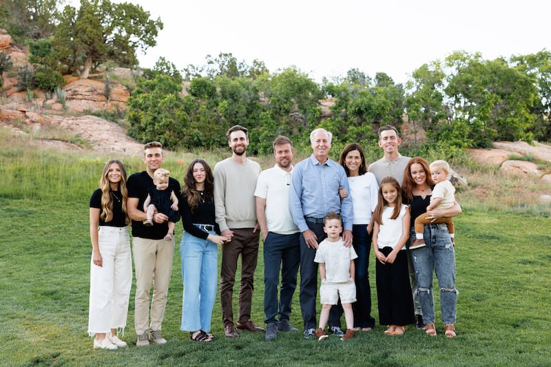 The Pilling family from left to right McKenna Larsen, Jordan Larsen (holding Ren Larsen), Nicole Graham, CJ Pilling, Travis Pilling, Peter Pilling (Oliver Pilling in front of Peter, Kyler Pilling (June Pilling in front of Kyler), Sara Pilling (holding Jack Pilling)