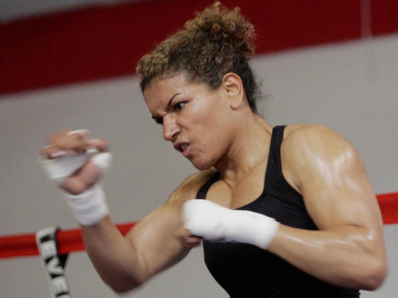 FILE - In this Friday, July 8, 2005 file photo, boxer Lucia Rijker works-out in a Los Angeles gym. A generational struggle culminates in London at the first Olympic women's boxing tournament. Rijker is only the most prominent example of women who became f