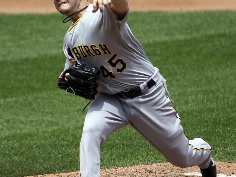 Pittsburgh Pirates starting pitcher Erik Bedard throws during the fourth inning of a baseball game against the St. Louis Cardinals, Thursday, May 3, 2012, in St. Louis. The Pirates won 6-3.