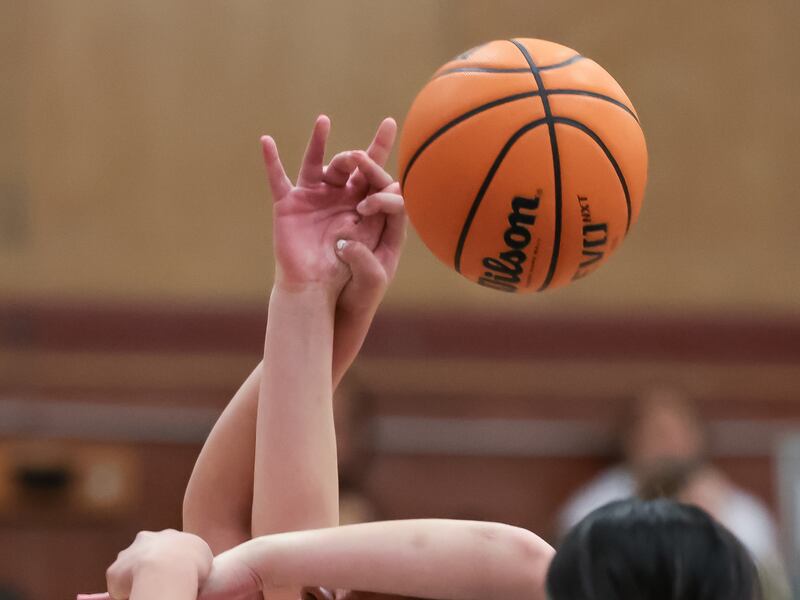 Players battle for the ball as Highland hosts Olympus in a high school girls basketball game on Jan. 20, 2023.