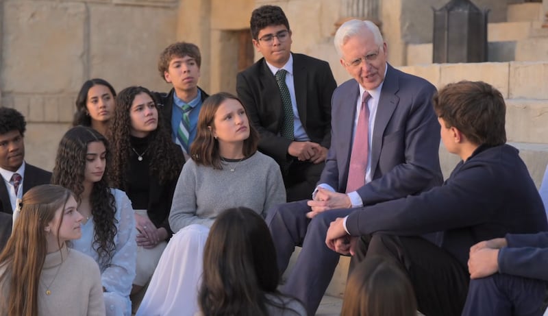 President D. Todd Christofferson, second counselor in the First Presidency, speaks with youth during the filming of the Jan. 18, 2026, worldwide discussion for youth on the Jerusalem set in Goshen, Utah.